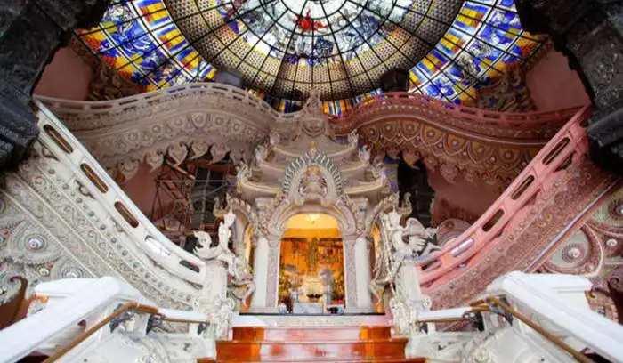 The massive three-headed copper elephant statue housing the Erawan Museum in Thailand